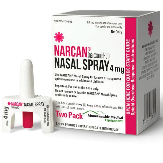 A photo of a box of Narcan Nasal Spray with the nasal spray sitting out in front of the box
